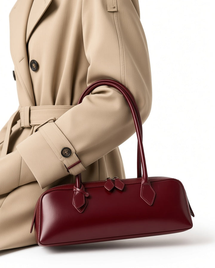 Éléanor French Baguette Leather Bag - close-up worn detail, white studio