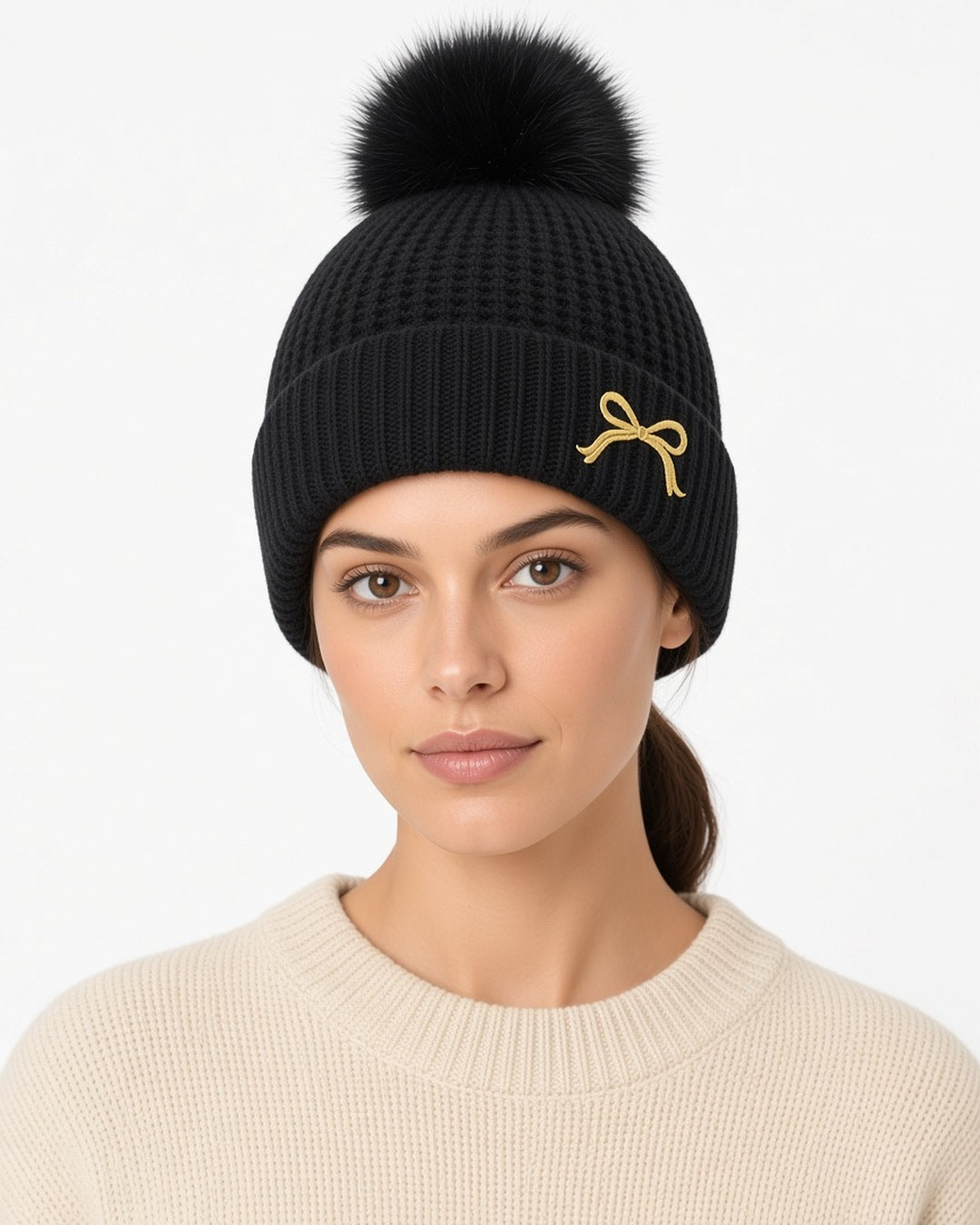 Posy Faux Fur Pom Bow Beanie - worn by model, front (white studio)