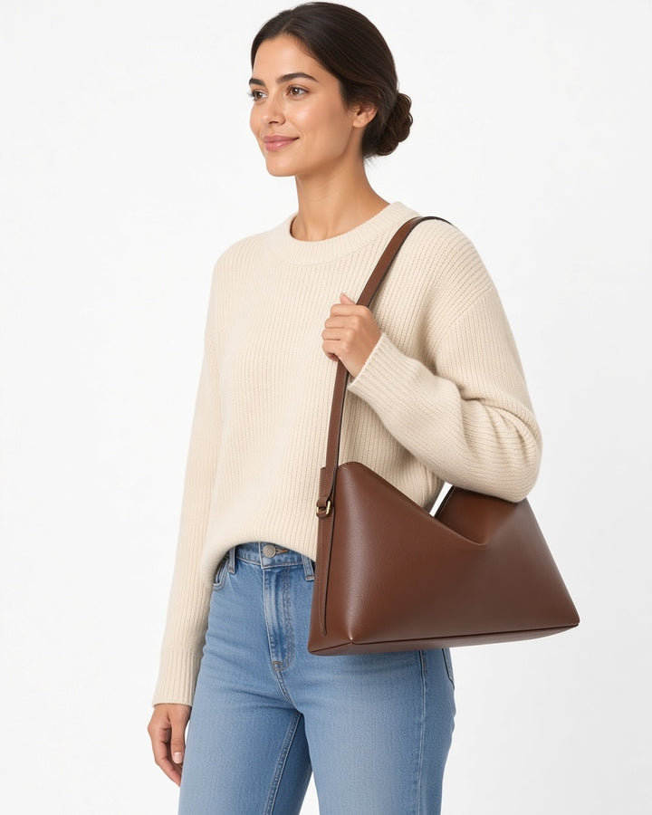 Béatrice Hobo Leather Bag - worn by model, waist-up, white studio