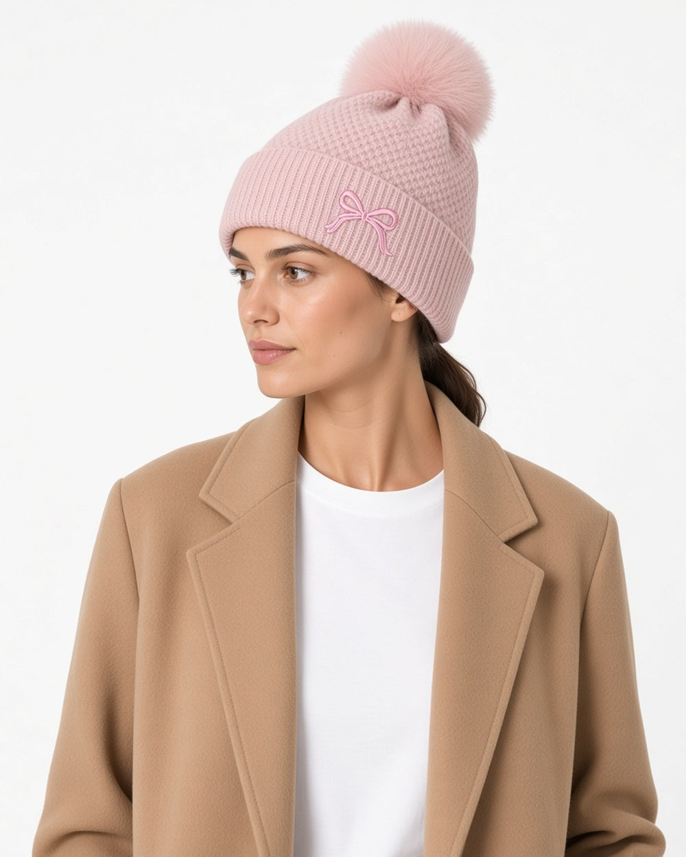 Posy Faux Fur Pom Bow Beanie - close-up worn detail, white studio