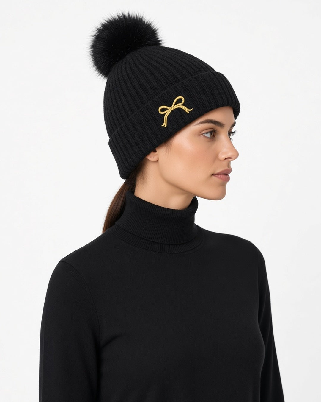 Posy Faux Fur Pom Bow Beanie - worn by model, profile (white studio)