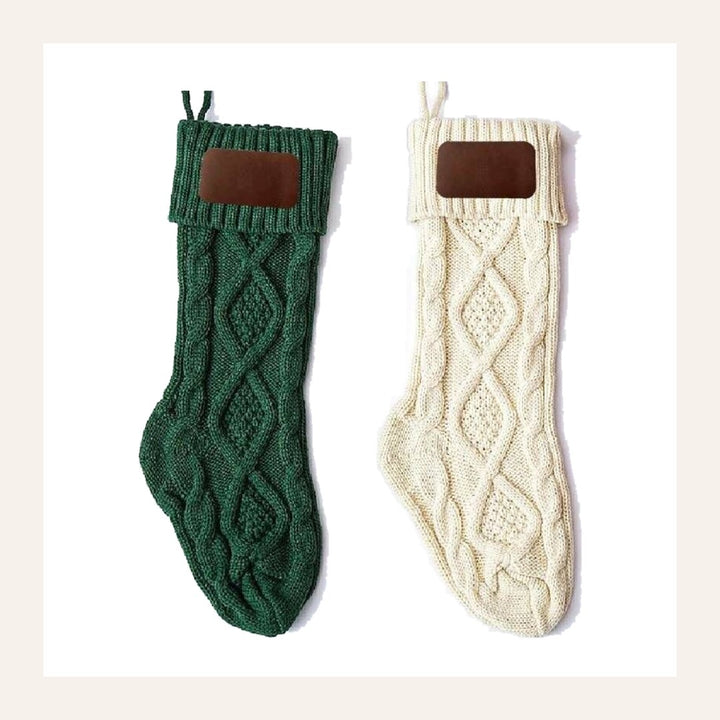 Noelle cable-knit stockings in green and cream