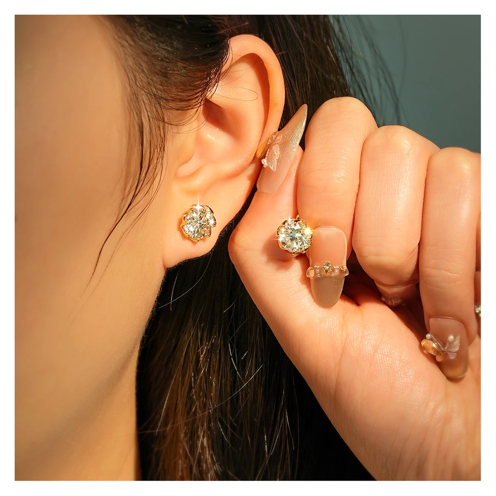 Stella studs in white gold tone, worn